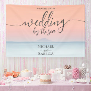 Wedding by the sea under peachy sky sunset banner