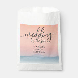 Wedding by the sea under peachy sky sunset favour bags