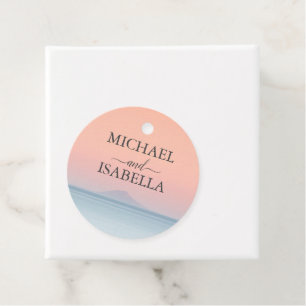 Wedding by the sea under peachy sky sunset favour tags