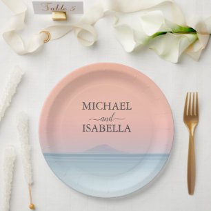 Wedding by the sea under peachy sky sunset paper plate