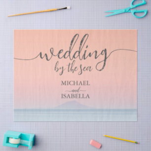 Wedding by the sea under peachy sky sunset tissue paper