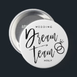 Wedding Dream Team | Black Script Rings Two 7.5 Cm Round Badge<br><div class="desc">Wedding Team custom name script lettering buttons with a set of wedding rings
and featuring the name of the special part of the wedding party in question.</div>