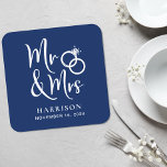 Wedding Favour Mr Mrs Navy Blue Square Paper Coaster<br><div class="desc">Decorate your wedding reception tables and give your wedding guests a fun souvenir keepsake of your special day with these custom dark navy blue coasters with "Mr & Mrs" written in a large white script and an illustration of two wedding rings joined together. Add your name and wedding date.</div>