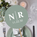 Wedding Monogram Bride And Groom Initials Classic Round Sticker<br><div class="desc">Elevate your wedding stationery with our charming Wedding Monogram Bride and Groom Initials Classic Round Stickers, a delightful blend of elegance and personalisation. Designed for couples seeking a touch of sophistication, these stickers add a special flair to your big day. Our customisable wedding monogram, featuring your initials intertwined in a...</div>