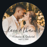 Wedding Photo Calligraphy Script Photo Thank You Classic Round Sticker<br><div class="desc">Modern Pretty Calligraphy Black White Script Thank You | Couple Photo Wedding sticker/label for yor gift favour. Featuring an elegant handwritten style calligraphy overlay with text „Love and Thanks”.</div>