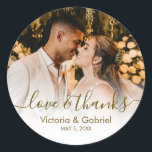 Wedding Photo Gold Script Photo Thank You Classic Round Sticker<br><div class="desc">Modern Pretty Gold Calligraphy Script Thank You | Couple Photo Wedding sticker/label for yor gift favour. Featuring an elegant handwritten style calligraphy overlay with text „Love and Thanks”.</div>