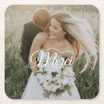 Wedding Photo Merci Beaucoup Classic  Square Paper Coaster<br><div class="desc">Add a touch of timeless elegance to your wedding celebration with our Wedding Photo Merci Beaucoup Classic Square Paper Coaster. This beautifully crafted coaster features a striking photo design that’s both sophisticated and versatile, making it the perfect addition to any wedding theme. Personalise the coaster with your favourite wedding photo...</div>