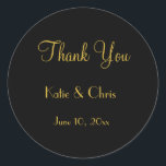 Wedding Thank You in Script Font Classic Round Sticker<br><div class="desc">A wedding thank you sticker in an elegant gold font accented with a black background makes this thank you gift chic and classy.</div>