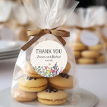 Wedding Thank You Watercolor Wildflowers Floral Classic Round Sticker<br><div class="desc">Wedding "Thank you" sticker with colourful watercolor wildflowers on a cream-coloured background. Personalised with the names of the bride and groom and their wedding date</div>