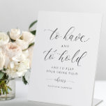 Wedding To Have & To Hold Keep Your Drink Cold Pedestal Sign<br><div class="desc">Enhance your wedding decor with our Personalised Self-Standing Modern Romantic Table Sign. This exquisite sign features a chic, swirly script that reads, "To have and to hold, and to keep your drink cold, " infusing a touch of romance and humour into your celebration. Add a personal touch by including the...</div>