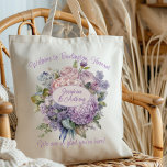 Wedding Welcome Lavender Bouquet Personalised Tote Bag<br><div class="desc">Floral wedding welcome bags with custom text. Lavender and pink bouquet with lavender text. "Welcome to (location)" is the curved text at the top on 100% cotton totes. Add names of the bride and groom in the centre oval, over the floral bouquet design. At the bottom, include a short thank...</div>