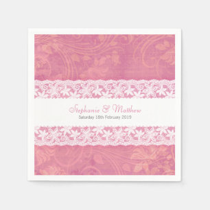 Wedding white lace on salmon pink paper napkins