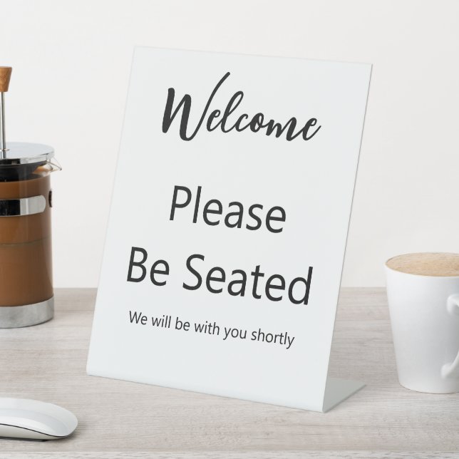Welcome Please Be Seated White and Black Script Pedestal Sign (In SItu)