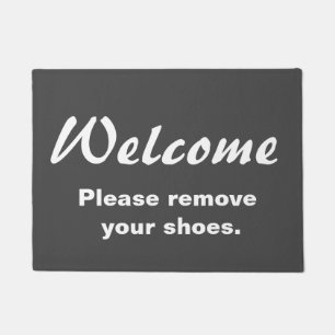 Welcome.  Please remove your shoes. Doormat