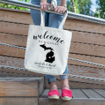Welcome to Michigan | State Silhouette Wedding Tote Bag<br><div class="desc">Give your guests a warm welcome to your Michigan wedding with a bag full of snacks and treats personalised with the state where you're getting married and the bride and groom's names and wedding date. Design features "welcome" in modern handwritten calligraphy script along with bride and groom's names and wedding...</div>