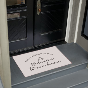 Welcome to our home modern script black and white doormat