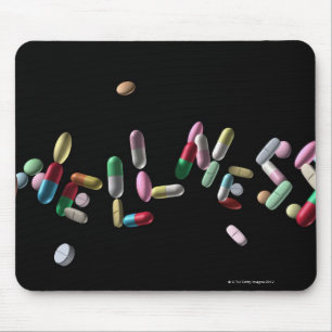 'WELLNESS' written with pills Mouse Pad