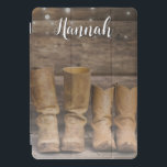 Western Cowboy Boots Rustic Barn Monogram iPad Pro Cover<br><div class="desc">This fun,  rustic iPad cover features two pair of cowboy boots and a log cabin wall with string lights. For the western or horse lover. Created by Simply Farmhouse Press; photo by Melanie Mauer on Unsplash.</div>