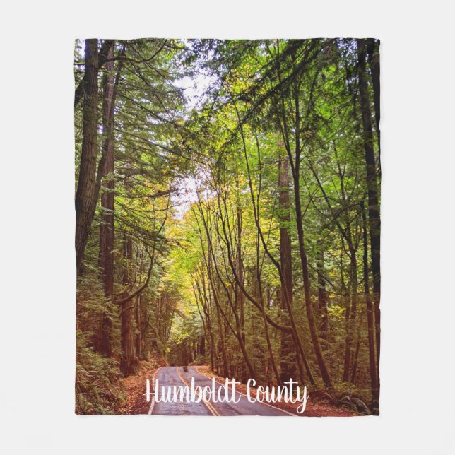 Wet Road Through Green Trees in Humboldt Autumn Fleece Blanket (Front)