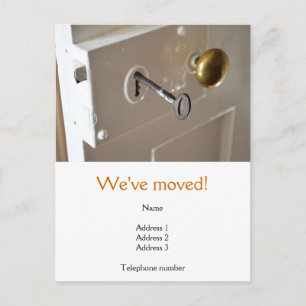 We've Moved Postcard with an old door & key
