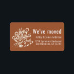 We've Moved Vintage Christmas Holiday New Address  Label<br><div class="desc">We've moved return address label with a Christmas holiday theme. A vintage Christmas image with the text Merry Christmas and a Happy New Year and Santa, sleigh and reindeer. Your family name and address in white stylish modern typography on a terracotta background. Festive holiday moving announcement for your change of...</div>