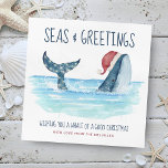 Whale Santa Sea Nautical Funny Christmas Holiday Card<br><div class="desc">Nautical humour Christmas card features a watercolor whale wearing a Santa hat swimming in the sea with string lights decorating its tail. The "Seas & Greetings" and "Wishing you a whale of a good Christmas" greetings,  along with the name can be personalised. Art by KL Stock</div>