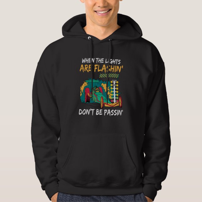 When the lights are flashin dont be passin Drag Ra Hoodie (Front)
