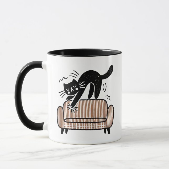 Whimsical Black Cat Scratching the Sofa Mug (Left)