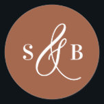 Whimsical Calligraphy Terracotta Wedding Monogram Classic Round Sticker<br><div class="desc">Add a charming finishing touch to your wedding stationery or favours with this wedding sticker featuring a whimsical calligraphy ampersand. Designed with a romantic yet modern flair, this sticker is perfect for sealing envelopes, decorating favour boxes, or adding a personalised detail to welcome bags and more. The hand-drawn ampersand adds...</div>