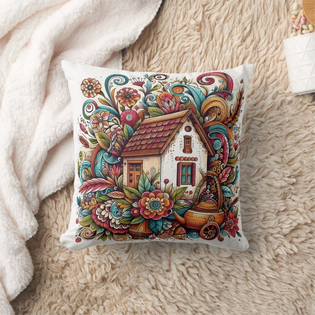 Whimsical cottage surrounded by vibrant foliage cushion (Blanket)