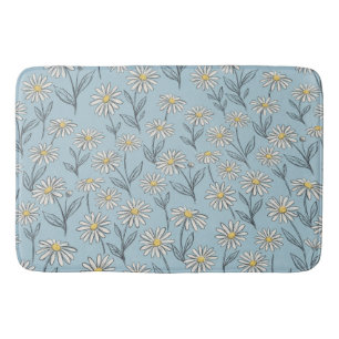 whimsical daisies on blue background bath mat
