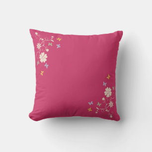 Whimsical Floral and Butterfly Accents on Pink Cushion