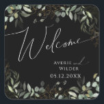 Whimsical Greenery Black and Gold Wedding Welcome Square Sticker<br><div class="desc">Step into a world of enchantment with our whimsical greenery black and gold wedding welcome square sticker, perfect for your botanical spring boho wedding. Adorned with sage green eucalyptus and gold accents, this welcome sticker exudes elegance and modern whimsy. Imagine strolling through a magical summer garden, surrounded by the soothing...</div>