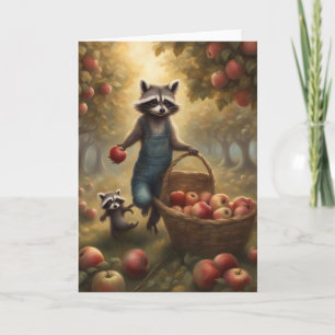 Whimsical Racoon picking apples in the orchard Card