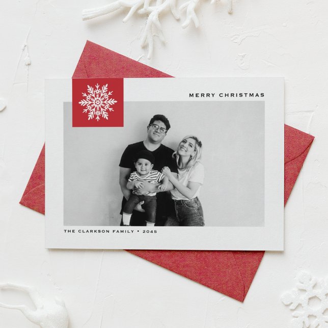 Whimsical Snowflake Red Merry Christmas Photo Holiday Card (Festive Christmas photo card featuring a whimsical white snowflake on a red background.)