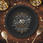 Whiskey Vintage Mens 50th Birthday Paper Plate<br><div class="desc">Celebrate the big 5-0 with style and humour with this vintage whiskey label-inspired birthday design. The black, gold, and white typography is ornate and elegant, giving it a classic retro vintage feel. Perfect for man (or woman!) in your life who loves their scotch, spirits, bourbon, and other liquor drinks. Features...</div>