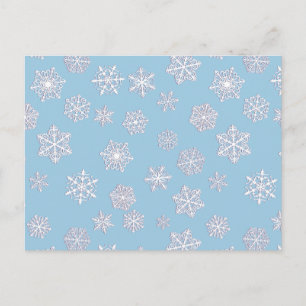 White 3-d snowflakes on an ice blue background postcard