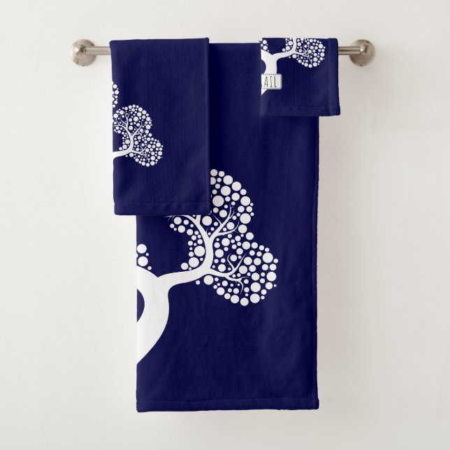 White abstract circle tree and name navy blue bath towel set (Insitu)