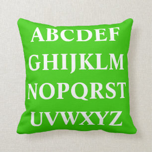 WHITE ALPHABET on  green plain pillow