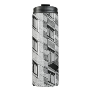 WHITE AND BLACK CONCRETE BUILDING THERMAL TUMBLER