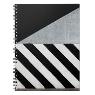 White and black diagonal striped paint on wall notebook