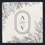 White and Black Greenery Wedding Monogram Stone Coaster<br><div class="desc">This White and Black Greenery Wedding Monogram Stone Coaster design offers a classic combination of simple minimalist typography with a neutral white and black colour story and chic line art greenery. The moody leaf silhouette embellishments are artfully arranged to create a beautiful flowing shape that sets off the polished geometric...</div>
