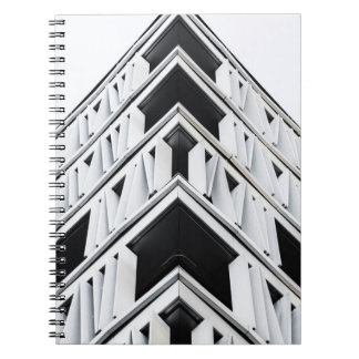 WHITE AND BLACK HIGH RISE BUILDING NOTEBOOK