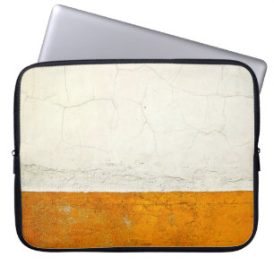 WHITE AND BROWN SURFACE LAPTOP SLEEVE