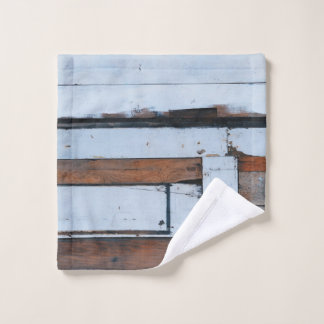 White and brown wooden board wash cloth