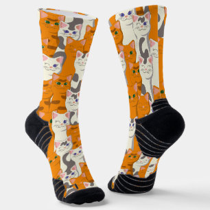 White and ginger cats pattern green eyes blue eyes socks