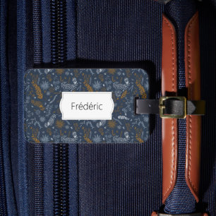 White and golden floral doodles in blue luggage tag