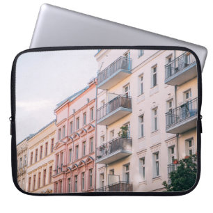 WHITE AND PINK BUILDINGS LAPTOP SLEEVE