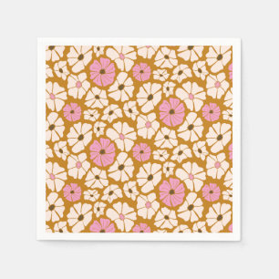 White and pink floral pattern on caramel brown napkin