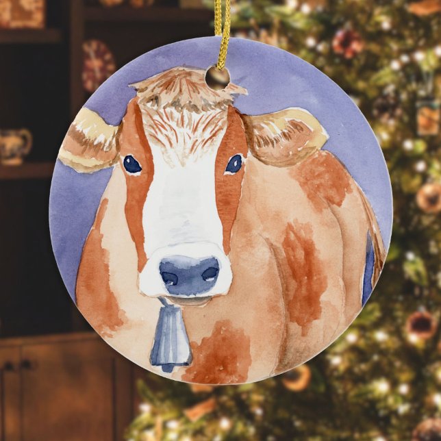 White and Red Cow (Friendly Beasts Series) Ceramic Tree Decoration (Cow White and Red Ornament hanging in front of a Christmas tree in a living room)